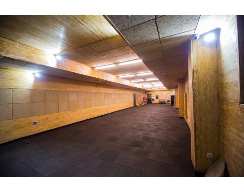 Ceiling and wall acoustic treatment in the shooting club